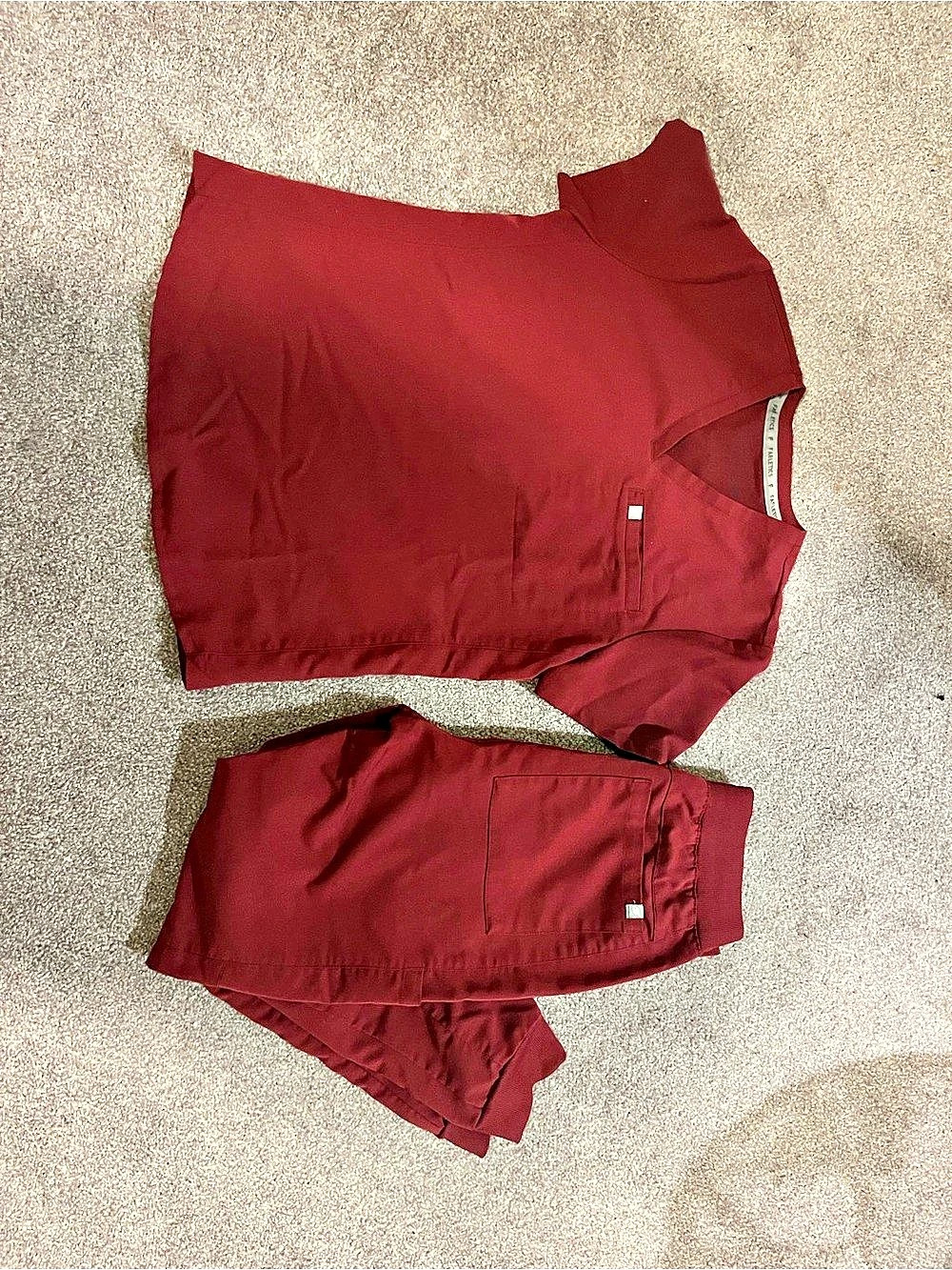 Fabletics High Rise On-Call Jogger and Vital-1 Pocket Scrub top Set Wine color